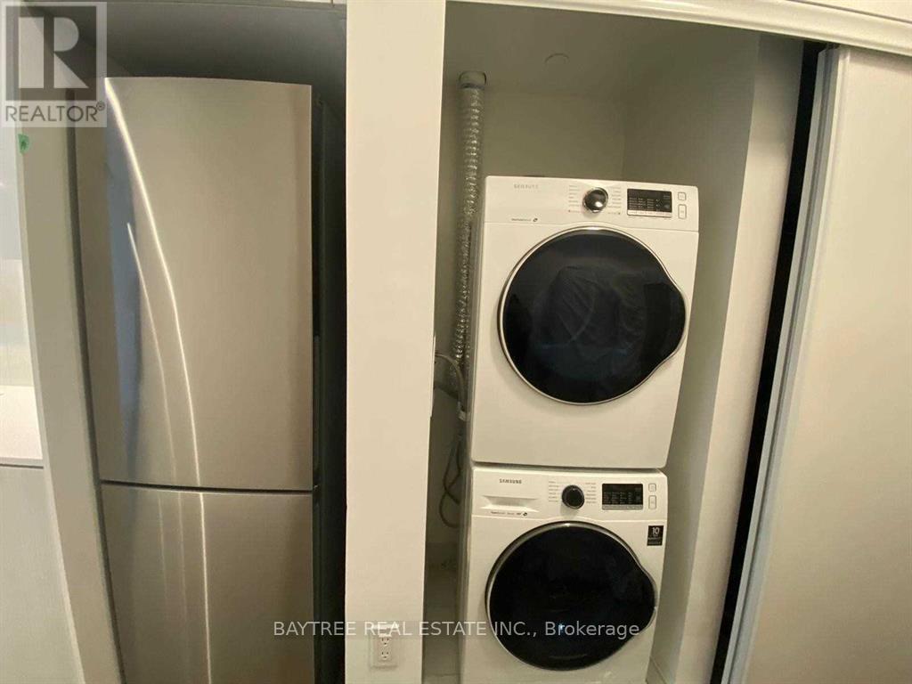 A washer and dryer are in a small space.