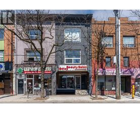 A street view of a building with a sign that says "Beauty Salon".