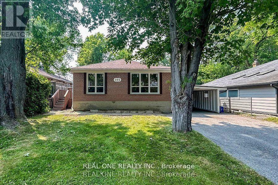 A house with a tree in front of it.