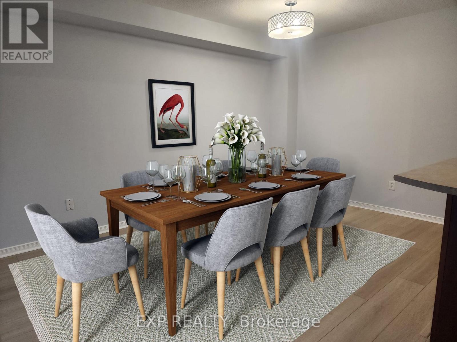 A dining room with a wooden table and grey chairs.