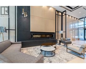 A modern living room with a fireplace and a couch.