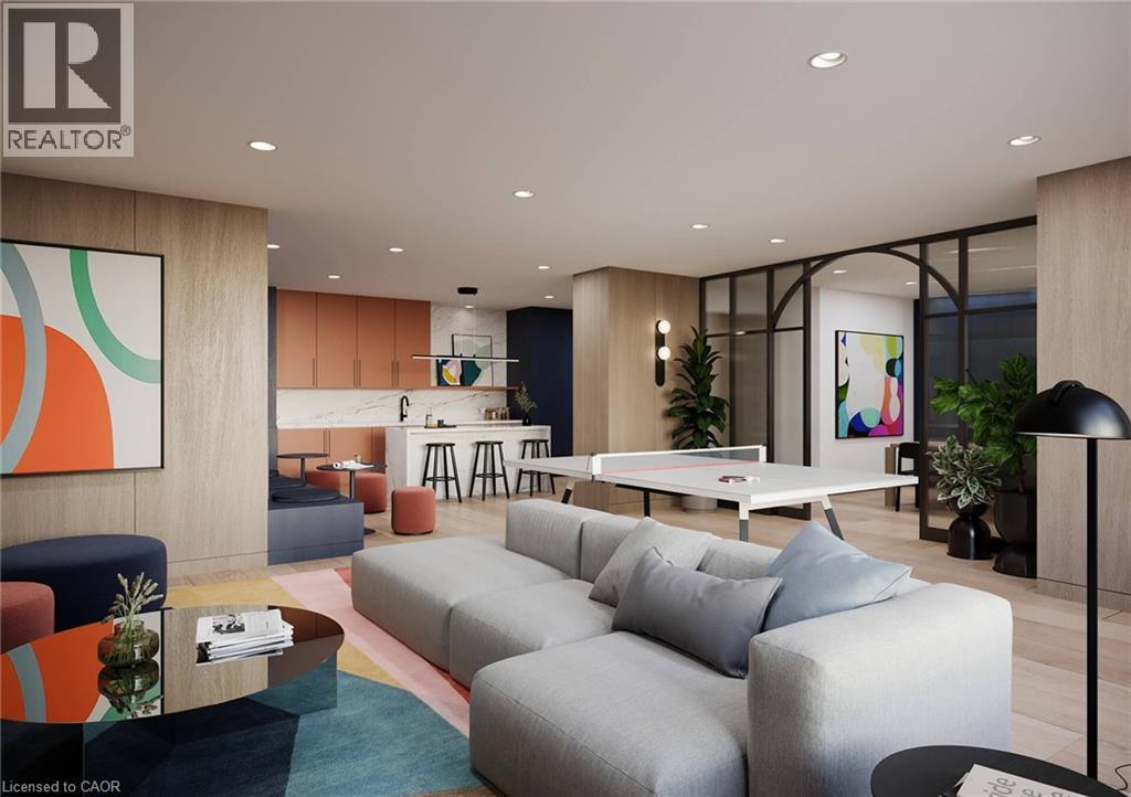 A modern living room with a grey sofa and a coffee table.