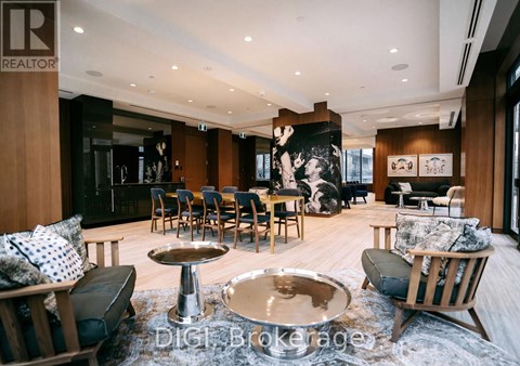 A modern living room with a large coffee table and comfortable seating.