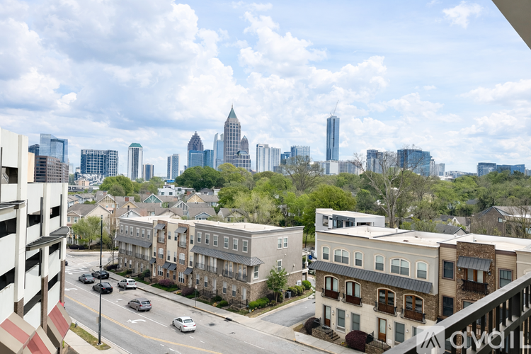A cityscape with a mix of modern and older buildings.