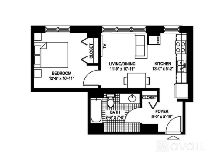 A floor plan of a small apartment with a bedroom, living/dining area, kitchen, and bathroom.