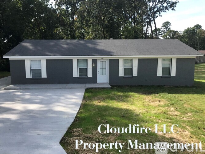 A house with the text Cloudflare LLC Property Management.