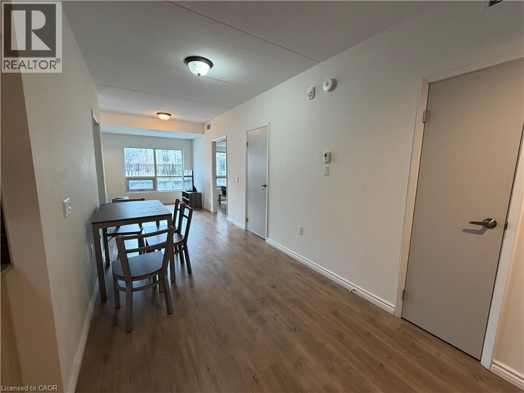 A dining room with a table and chairs is shown.