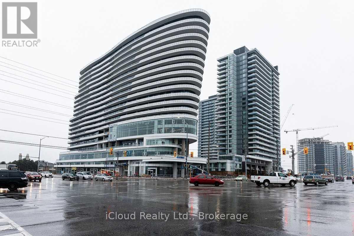 A modern building with a curved facade is the focal point of the image.