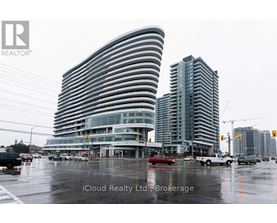 A modern building with a curved facade is the focal point of the image.