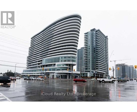 A modern building with a curved facade is the focal point of the image.