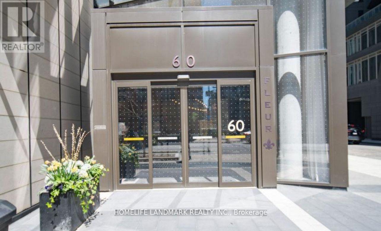 The entrance to a building with a glass door and a sign that reads "Element 60".