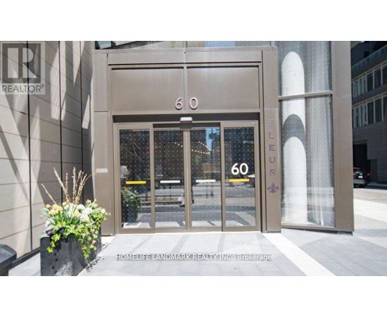 The entrance to a building with a glass door and a sign that reads "Element 60".