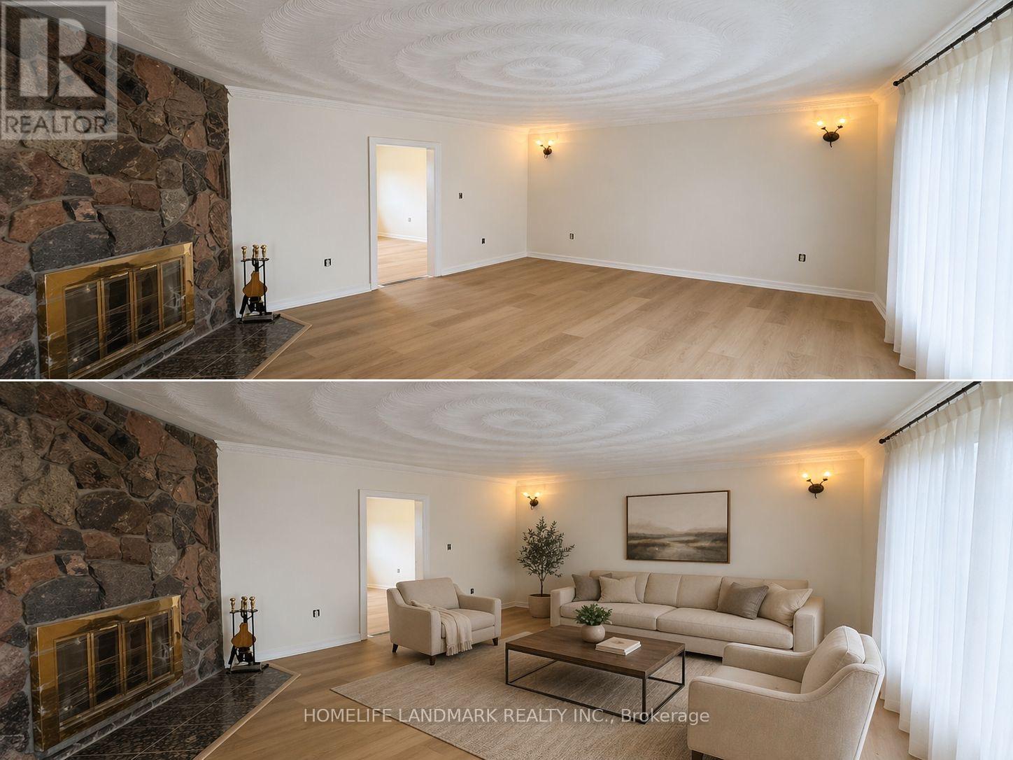 A living room with a stone fireplace and a couch.