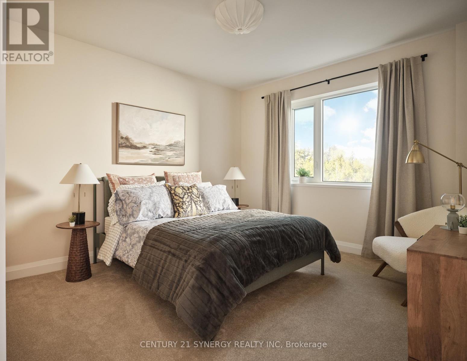 A bedroom with a large bed and a painting on the wall.