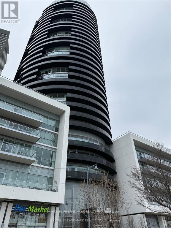 A tall building with a curved design and a sign that says "Market".