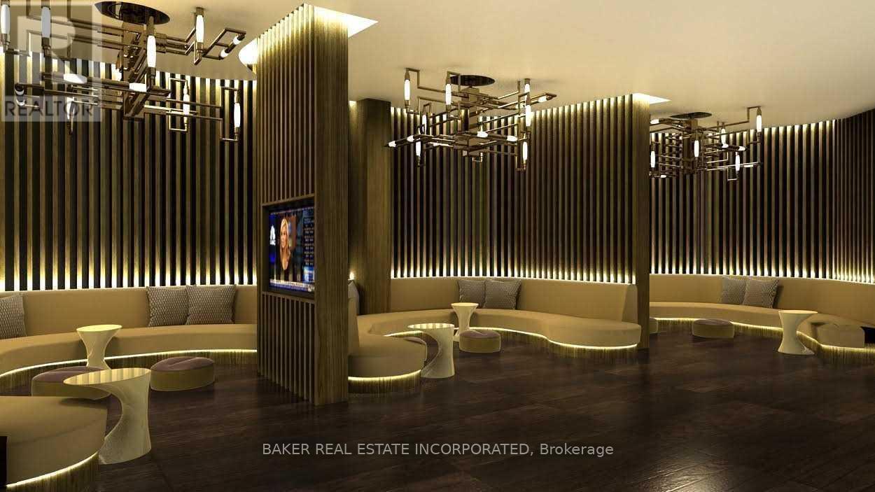 A modern office space with a reception desk and seating area.