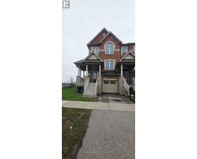 A two-story house with a front porch and a garage.