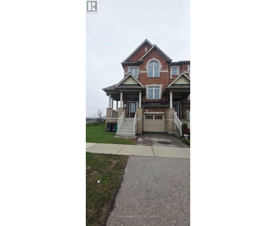 A two-story house with a front porch and a garage.