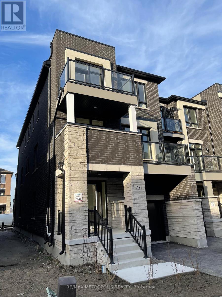 A modern apartment building with a sign that reads "REMAX METROPOLITAN REALTY - Brokerage".
