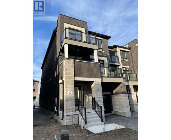 A modern apartment building with a sign that reads "REMAX METROPOLITAN REALTY - Brokerage".