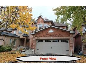 A house with a front view and a garage.