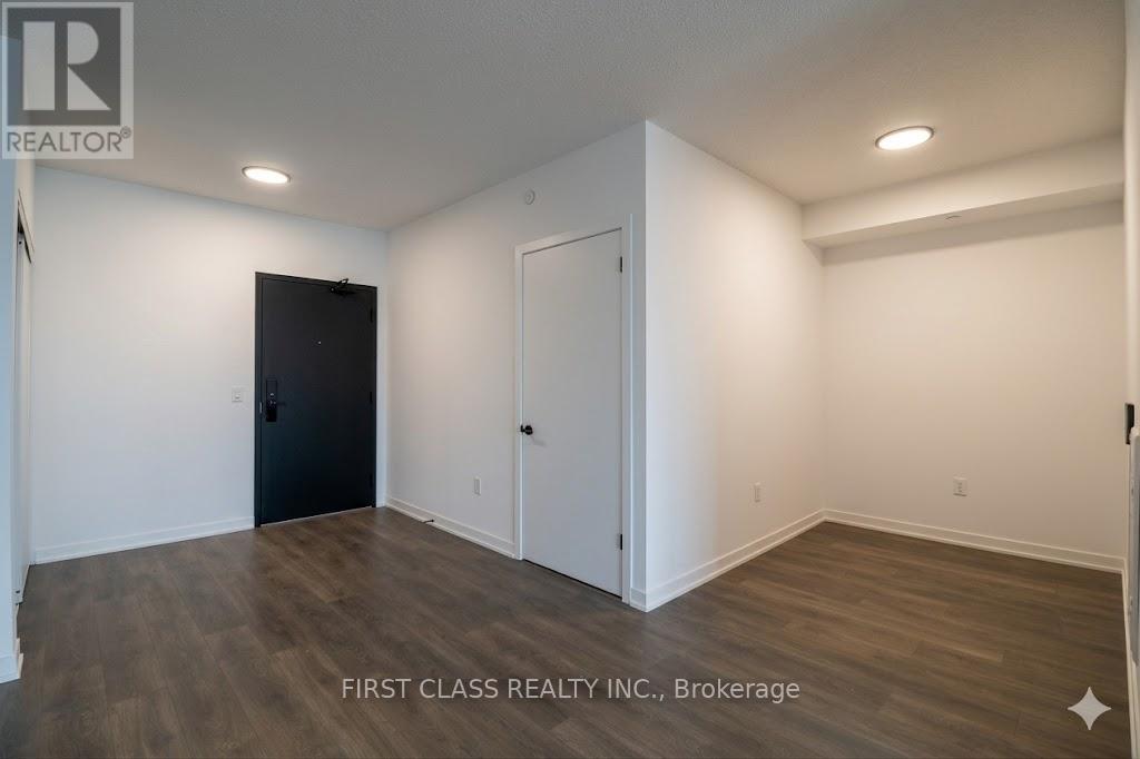 A room with a black door and a white door.