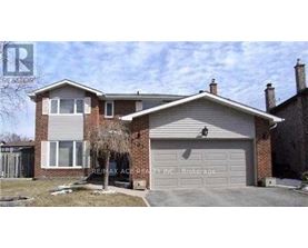 A house with a garage is for sale.