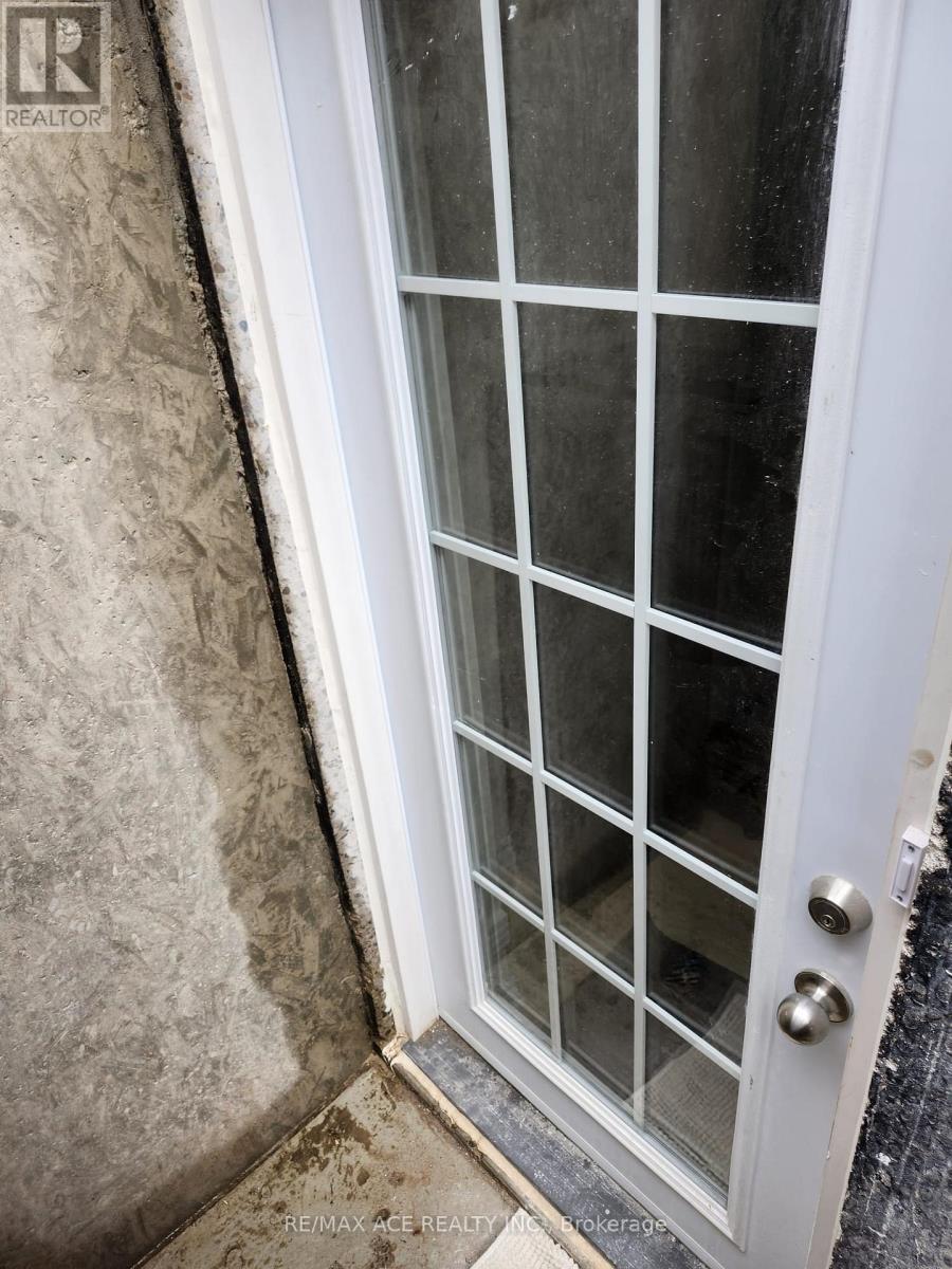 A white door with glass panes and a handle.