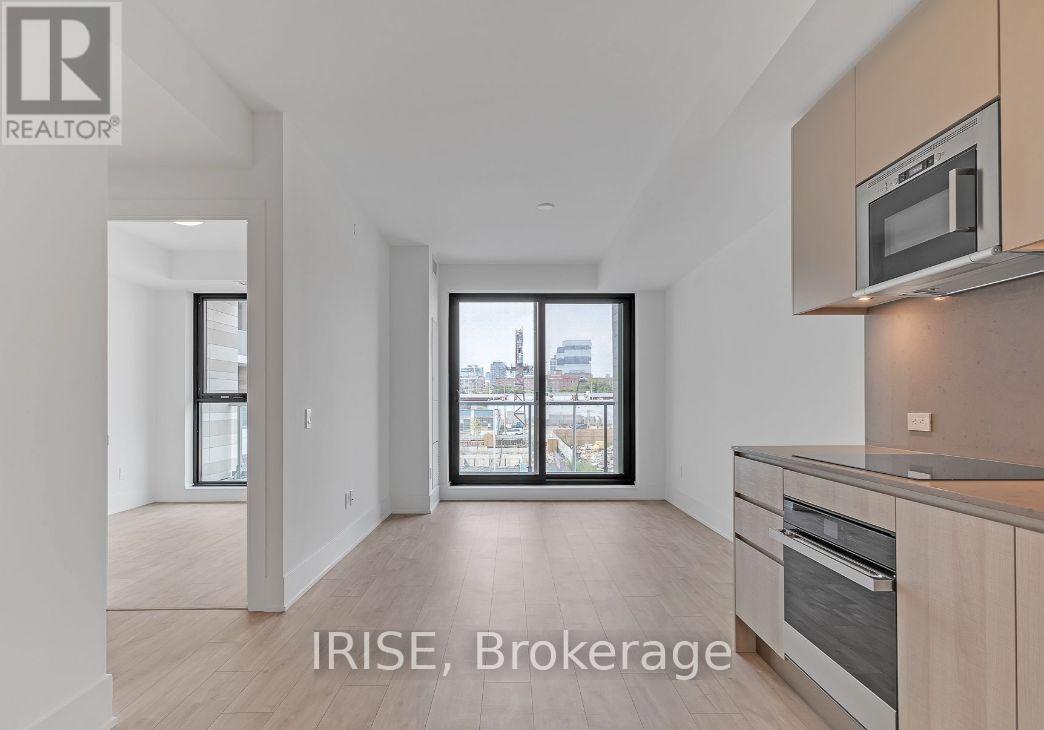 A modern kitchen with a microwave above the stove.