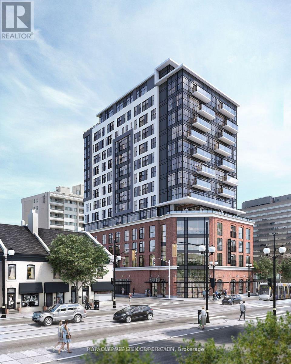 A rendering of a modern glass building in a city setting.