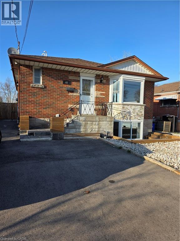 A house with a brick exterior and a garage.
