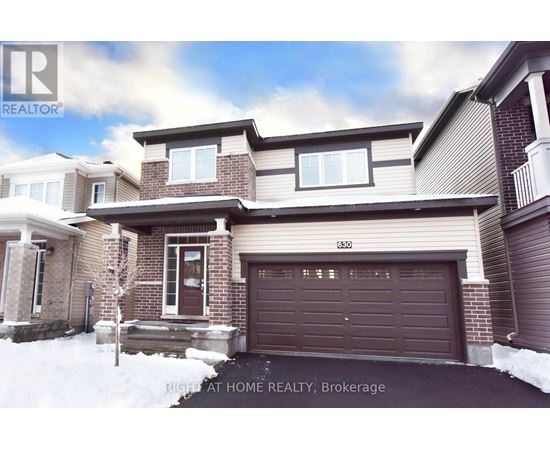 A house with a brown garage door is for sale in Brokerage.