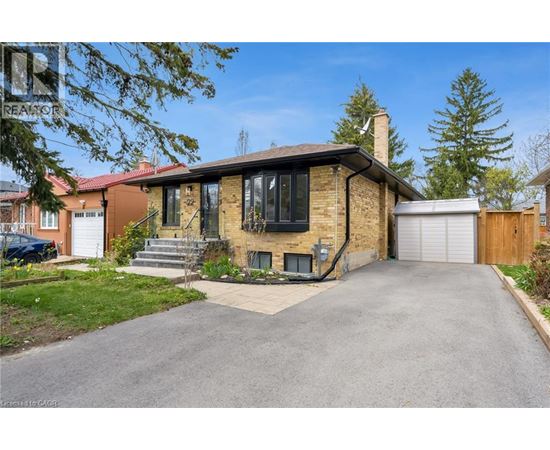 A house with a driveway in front of it.