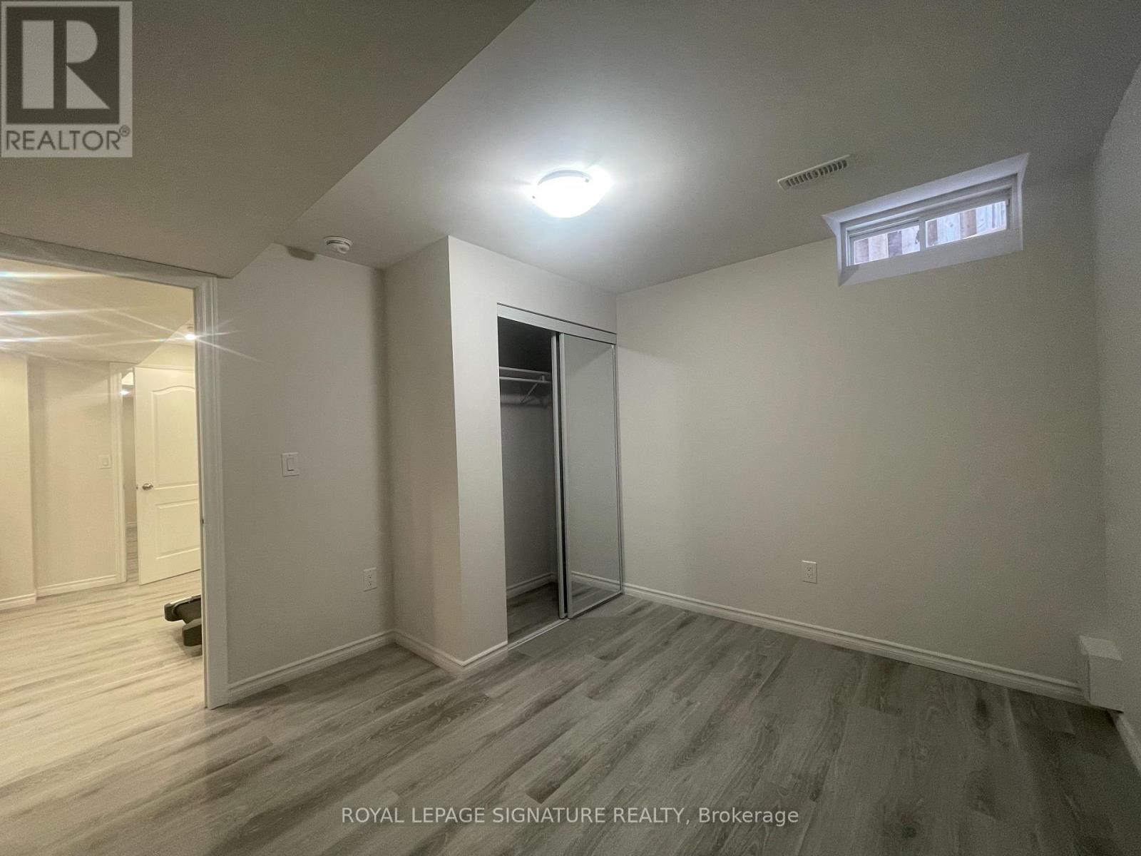 A room with a door and a window.