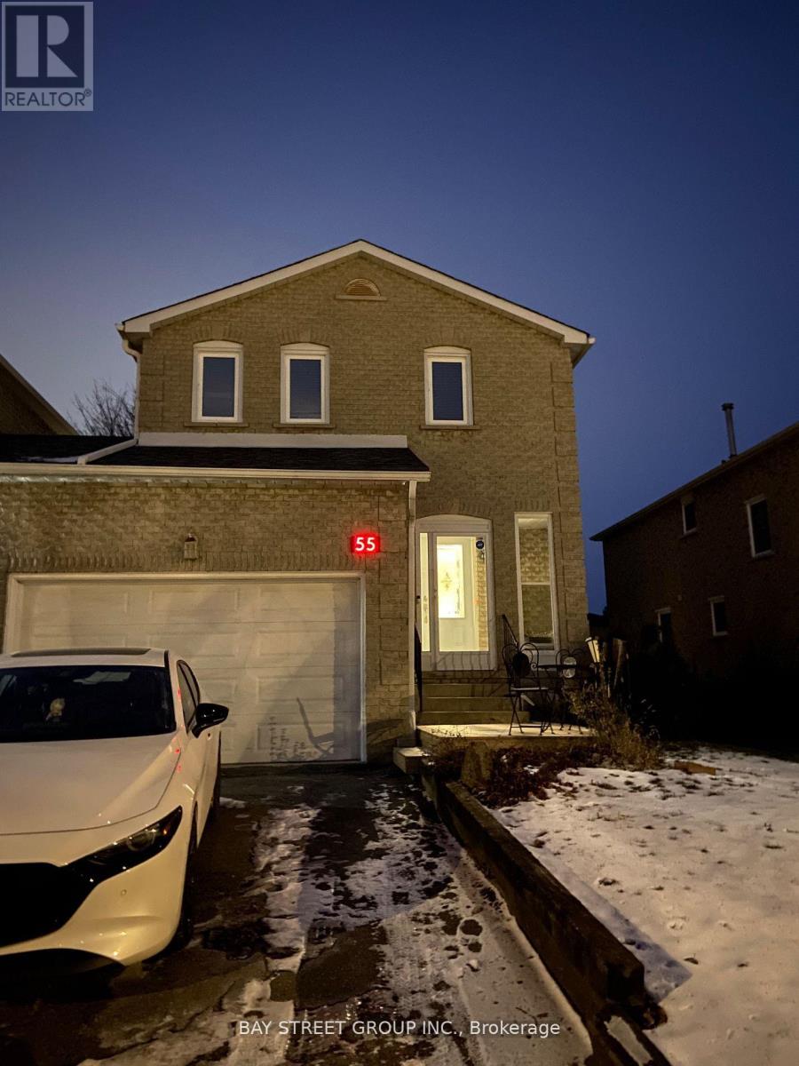 A house with a car parked in front of it.