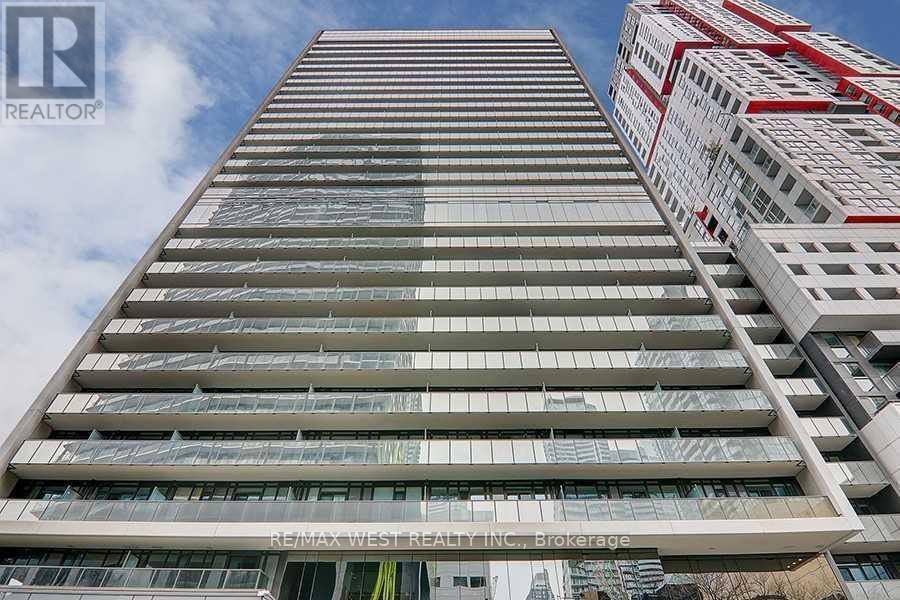 A tall building with a sign that says REALTOR.