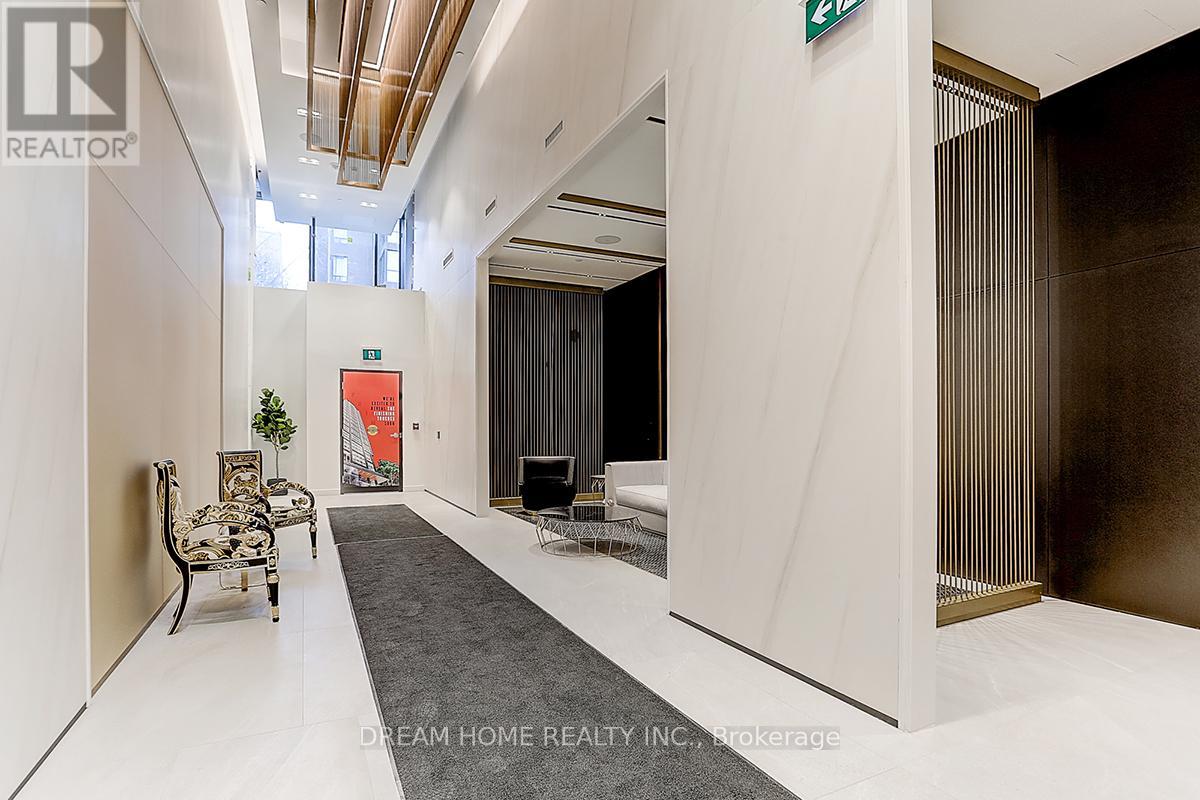 A modern living room with a white floor and a grey carpet.