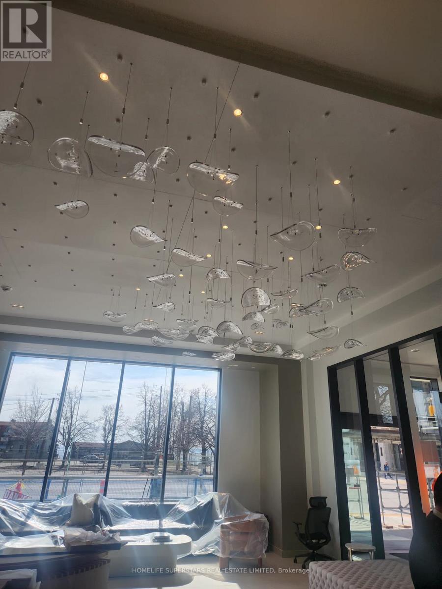 A modern interior with a glass ceiling and a view of the outdoors.