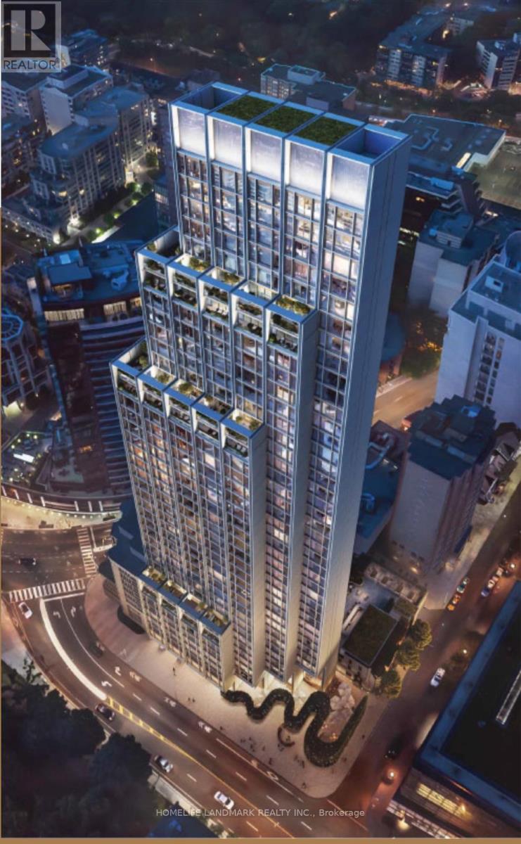 A tall building with a lot of windows and balconies is shown in the image.