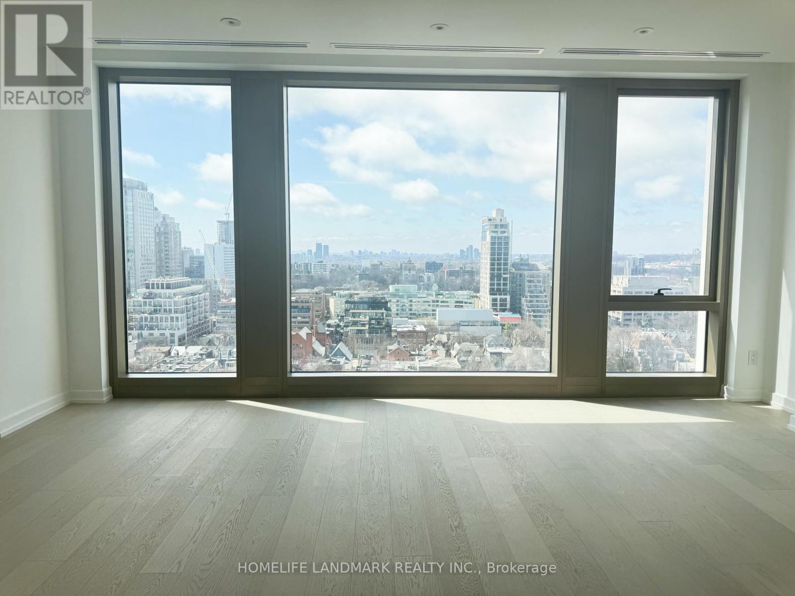 A realtor's office with a view of the city.