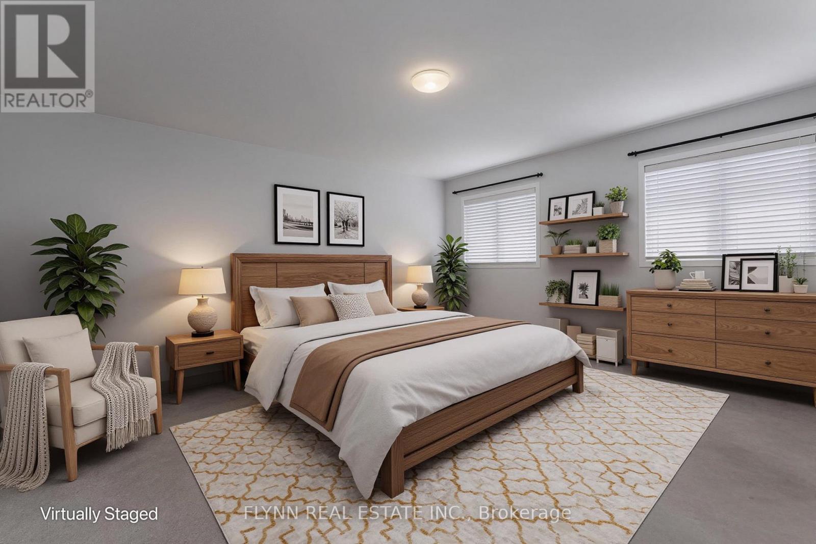A bedroom with a large bed, a chair, and a plant.