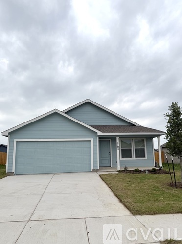 A two-car garage with a blue exterior.