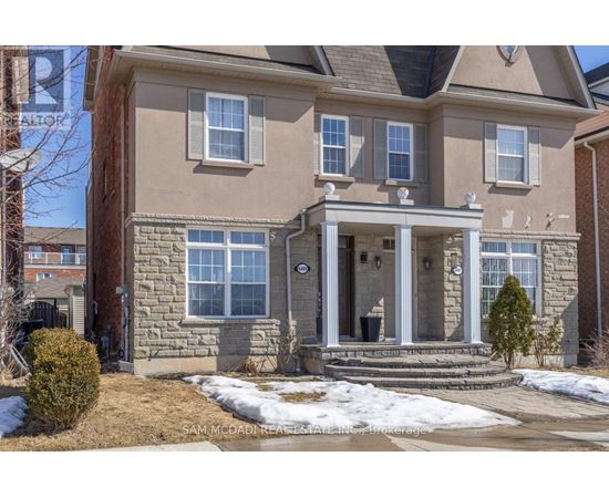 A house with a front yard and a snow-covered ground.
