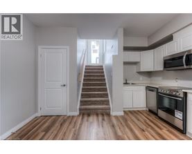 A white door is in the hallway.