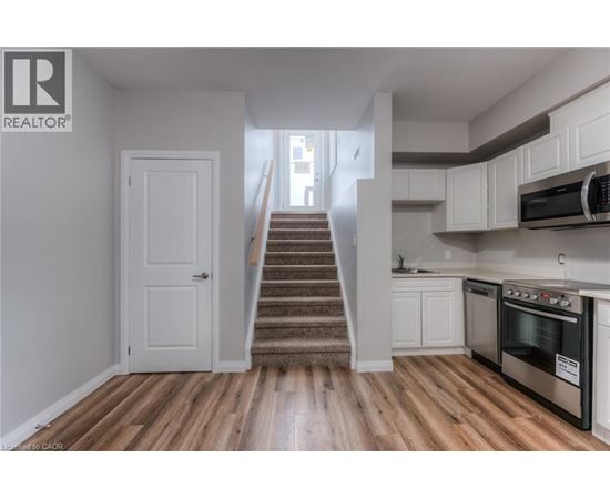 A white door is in the hallway.
