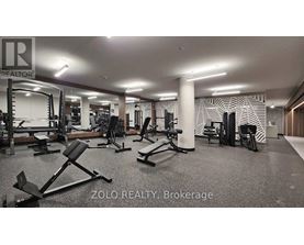 A gym with a variety of equipment is labeled ZOLO REALTY, Brokerage.