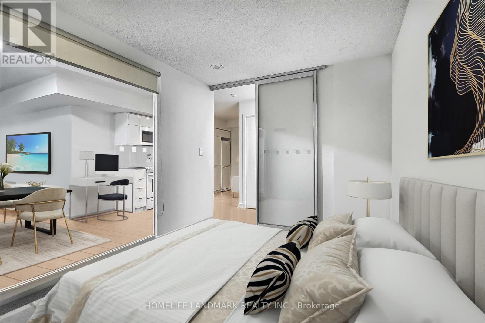 A bedroom with a large bed and a television in the living room.