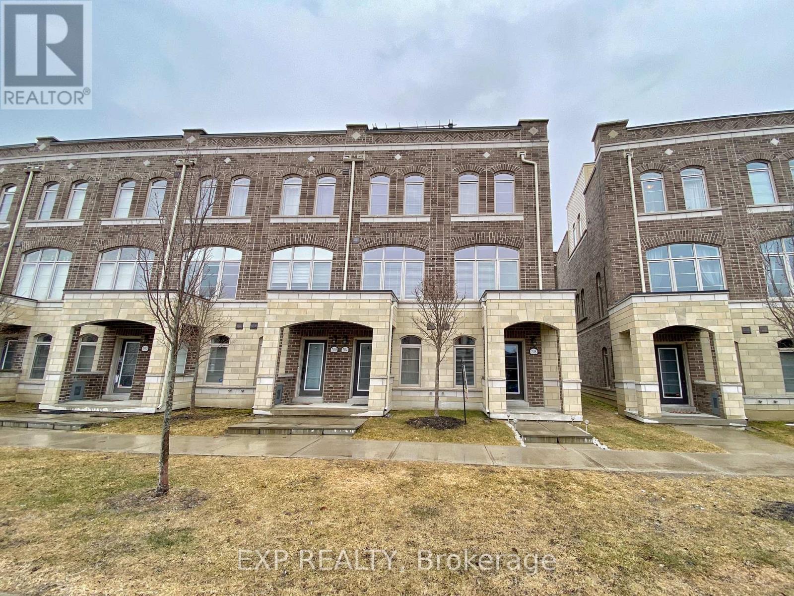 A building with the text EXP REALTOR Brokerage on the front.