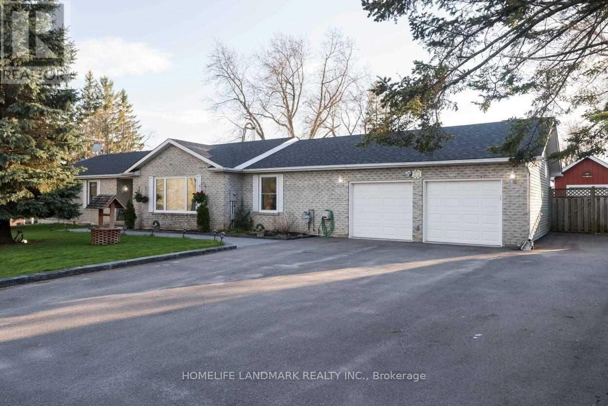 A two-story house with a garage is shown in the image.