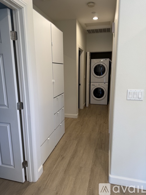 A laundry room with a washer and dryer.